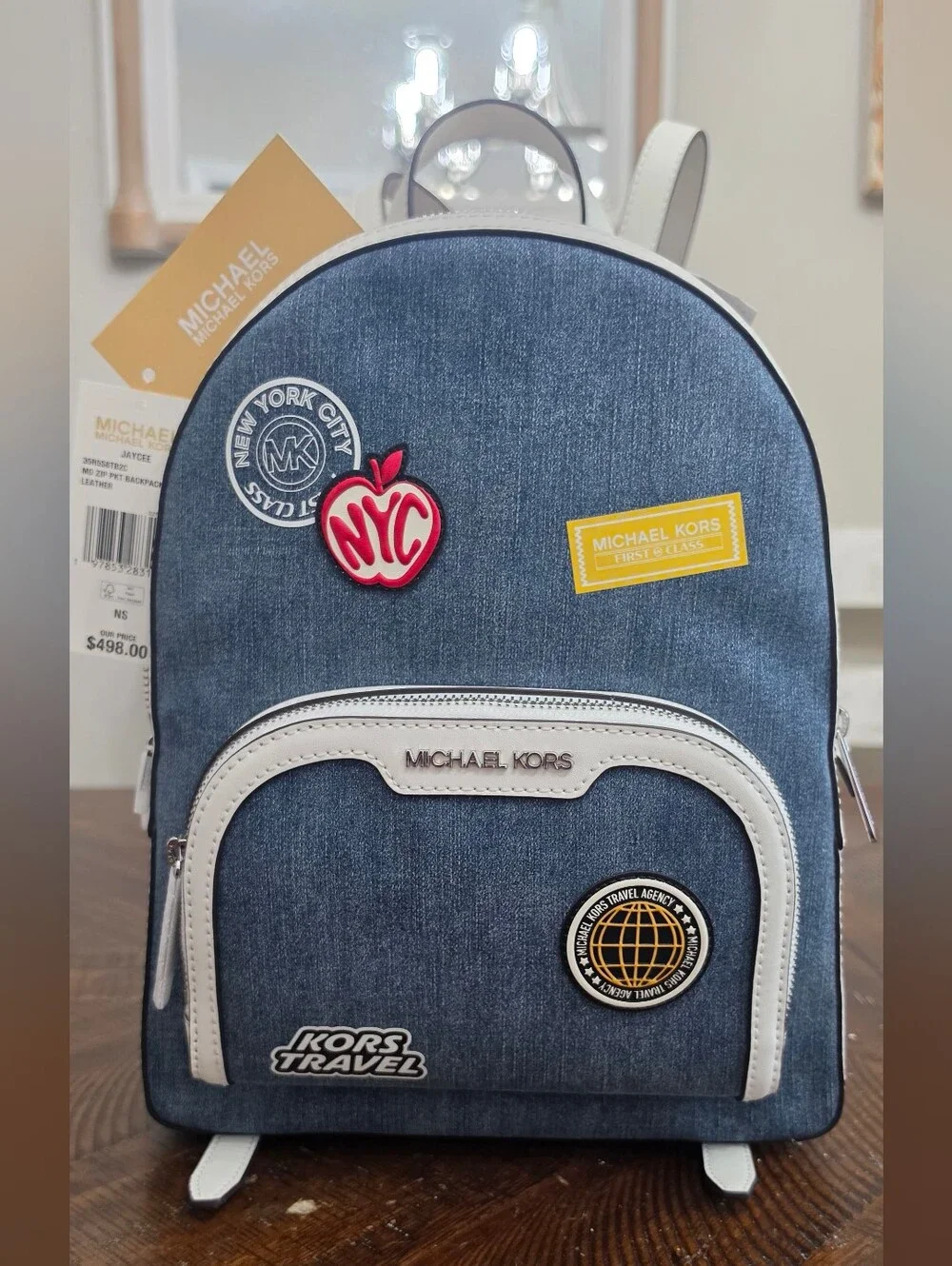 Michael Kors Denim Blue Backpack with White Trim and Travel Patches
